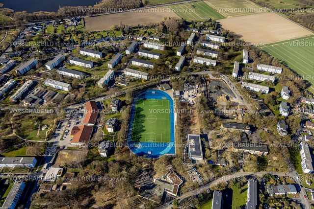 Dortmund250300059 | Luftbild, Fußballstadion des BV Teutonia 1920 Dortmund-Lanstrop e.V., Hochhaussiedlung und Mehrfamilienhaus Wohnanalage Büttnerstraße und Einkaufszentrum mit Netto Supermarkt in der Färberstraße, Lanstrop, Dortmund, Ruhrgebiet, Nordrhein-Westfalen, Deutschland