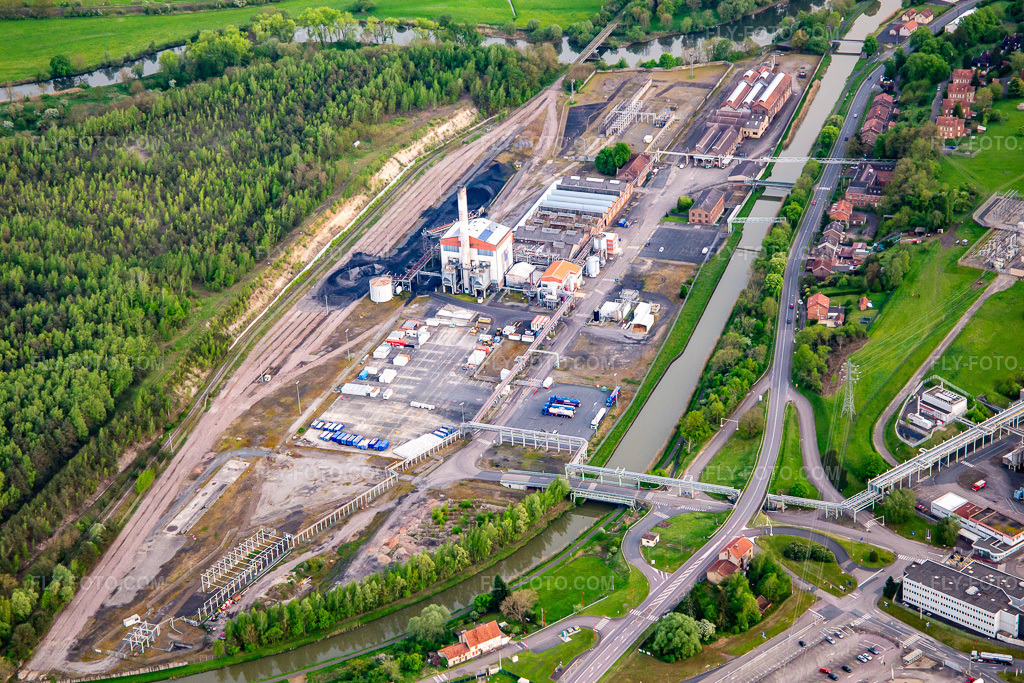 Aerial view: Industrial Estate Rue Ernest Solvay in Willerwald in the state Moselle, France. – Photo: IMG_140508.jpg taken on 04/30/2024 by Werner Riehm/FLY-FOTO.com – Resolution of the original: 5326 x 3551 px