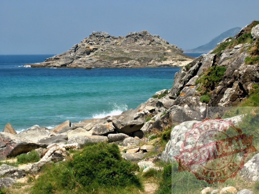 Galicia coast rocky shoreline with turquoise Atlantic water. Galicia - Spain | Rugged rocky shoreline meeting the clear turquoise water of the Atlantic Ocean in Galicia - Realized with Pictrs.com