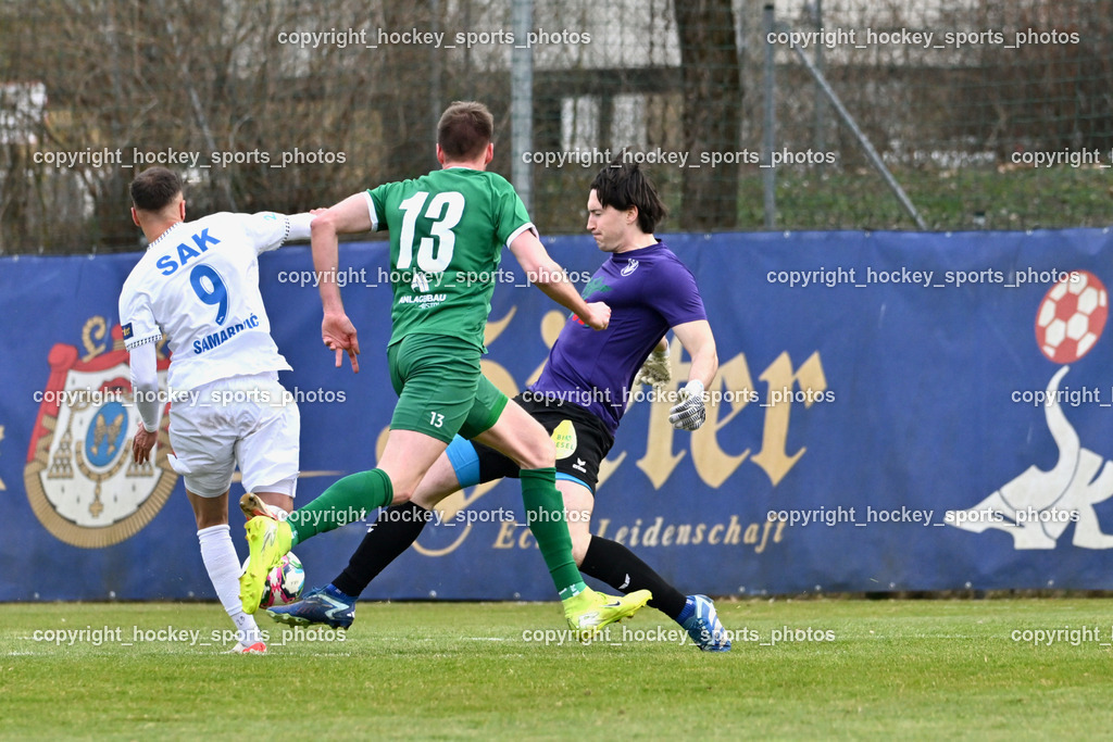 SAK vs. VST Völkermarkt | #9 Sinan Samardzic SAK, #13 Mario Daniel Gugganig VST Völkermarkt, #1 Florian Alexander Zitterer  VST Völkermarkt, SAK vs. VST Völkermarkt, SAK vs. VST Völkermarkt am 21.03.2026 in Klagenfurt (Sportpark Welzenegg), Austria, (Photo by Bernd Stefan)