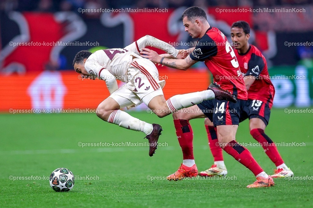 UCL11032501040 | 11.03.2025, Fußball, UEFA Champions League, Bayer 04 Leverkusen - FC Bayern München, Achtelfinale Rückspiel, BayArena, Saison 2024 2025: Musiala (FC Bayern #42) im Zweikampf gegen Granit Xhaka (Bayer04 Leverkusen #34)  stürzt zu Boden im Zweikampf gegen xxxxxxxxxxDFB regulations prohibit any use of photographs as image sequences and or quasi-video.
