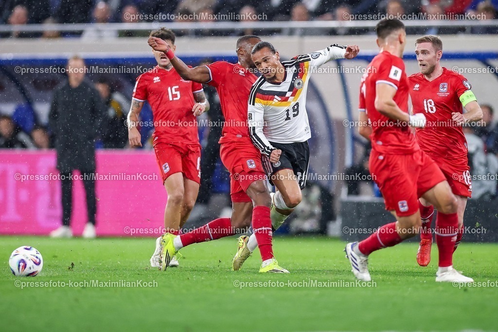 DFB14112501069 | 14.11.2025, Fußball, Länderspiel, WM-Qualifikation Europa, Deutschland - Luxemburg, Stade de Luxembourg (Croix de Gasperich, Luxemburg), 9. Spieltag, Saison 2025 2026: Leroy Sane (GER #19) wird von der Abwehr zu gemacht  Regulations prohibit any use of photographs as image sequences and or quasi-video.