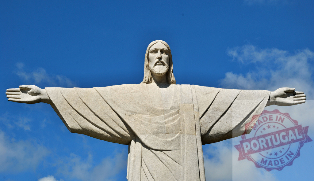 Christ the Redeemer statue embracing blue sky in Rio de Janeiro. Galicia - Spain | Christ the Redeemer statue standing proudly on Corcovado mountain, representing faith and spirituality - Realized with Pictrs.com