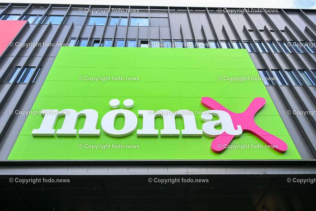 Eroeffnung Moemax Linz_ 15.05.2024-6 | 15.05.2024, Linz, AUT, Eroeffnung Moemax, im Bild Schild, Logo