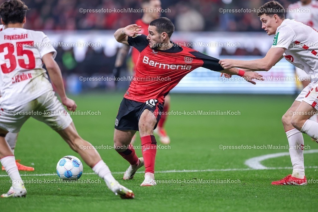 DFB05022501072 | 05.02.2025, Fußball, DFB-Pokal Viertelfinale, Bayer 04 Leverkusen - 1.FC Köln, BayArena, Saison 2024 2025: Emiliano Buendia Stati (Bayer04 Leverkusen #16) gegen Eric Martel (FC Köln #6)  im ZweikampfDFB regulations prohibit any use of photographs as image sequences and or quasi-video.