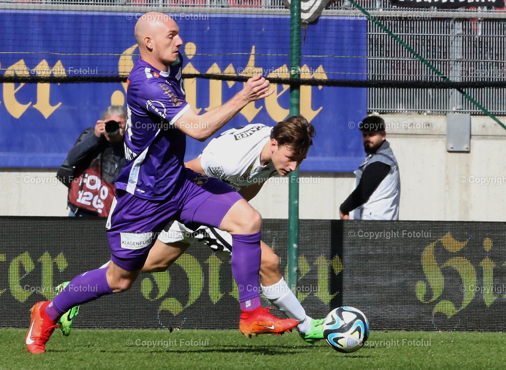 A_LUI_17032024_09 | SPORT,FUSSBALL, ADMIRAL BUNDESLIGA AUSTRIA KLAGENFURT-SK STURM GRAZ  17.03.2024 IM BILD: NICOLAS WIMMER (KLAGENFURT) UND WILLIAM BOVING  (STURM GRAZ) FOTO:FOTOLUI/MW