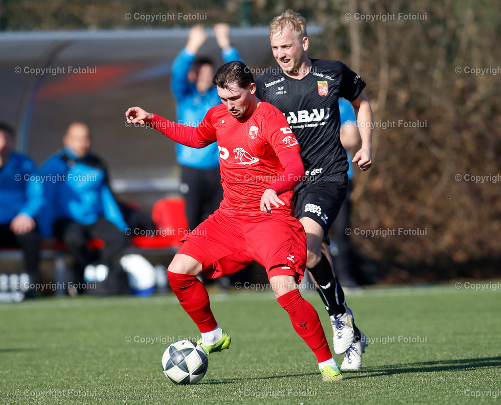 A_LUI_07032026_20 | SPORT,FUSSBALL, LT1 OOE LIGA ASKOE OEDT-UNION PERG 07.03.2026 IM BILD: FLORIAN AIGNER (OEDT1B) UND  SIMON PETER STOEBITZER (PERG) BILD: FOTOLUI 