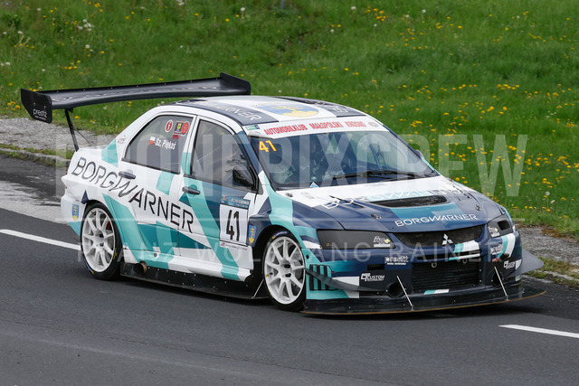 Rechberg Hill Climb 2025 – FIA European Hill Climb Championship | Rechberg Hill Climb 2025, part of the FIA European Hill Climb Championship. High-speed racing action, mountain scenery, atmosphere and pure motorsport passion captured in detail. The image shows Szymon Piękos (POL) Mitsubishi Lancer Evo 9.          