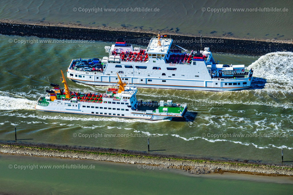 Norddeich_Fähren_Frisia_Iv_Inselfracht_ELS_7409050923 | NORDEN 05.09.2023 Fahrt eines Fähr- Schiffes der AG Reederei Norden-Frisia Schiff " Frisia 4 " und der Lastfähre " Inselfracht " in Norden Norddeich im Bundesland Niedersachsen, Deutschland. Weiterführende Informationen bei: Reederei Norden-Frisia AG. // Journey of a ferry ship of the AG Reederei Norden-Frisia ship "Frisia 4" and the cargo ferry "Inselfreight" in Norden Norddeich in the state Lower Saxony, Germany. Further information at: Reederei Norden-Frisia AG. Foto: Martin Elsen