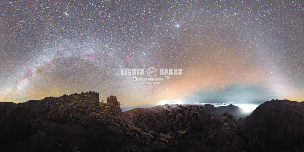 Arches | The winter Milky Way of the Northern Hemisphere arching over the Roque des los Muchachos in La Palma. But there are more arches. The arch of the Zodiac Light from the right, colliding with planet Jupiter and then joining the Milky Way. And there is also an Arch of sand in the air, as it was a heavy Calima (sandstorm). - Realisiert mit Pictrs.com