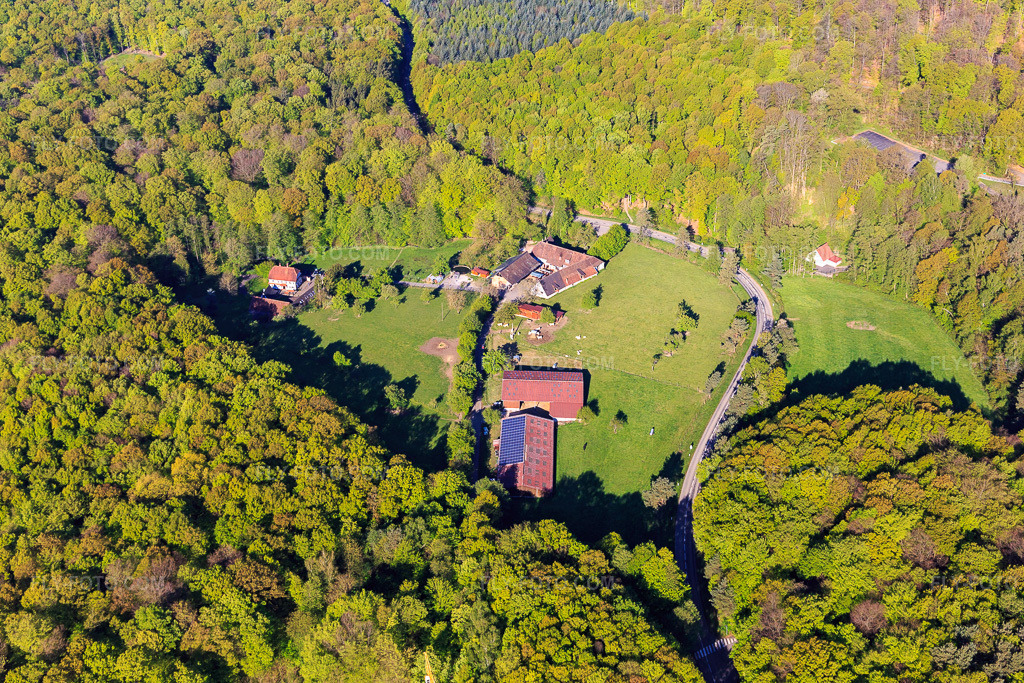 Aerial view: Ferme Auberge du Moulin des Sept Fontaines in Drachenbronn-Birlenbach in the state Bas-Rhin, France. – Photo: IMG_099330.jpg taken on 04/30/2017 by Werner Riehm/FLY-FOTO.com – Resolution of the original: 5472 x 3648 px – WWW.AUBERGE7FONTAINES.COM