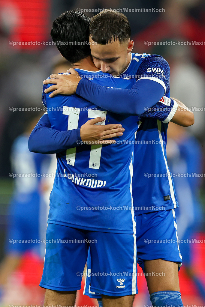Koe14092402217 | 14.09.2024, 2. Fußball Bundesliga, 1. FC Köln - 1. FC Magdeburg, RheinEnergieSTADION, Saison 2024 2025: Freude nach dem 2:1 Sieg - Mohammed El Hankouri (1.FC Magdeburg #11) und Falko Michel (1.FC Magdeburg #21) liegen sich in den ArmenDFB regulations prohibit any use of photographs as image sequences and or quasi-video.