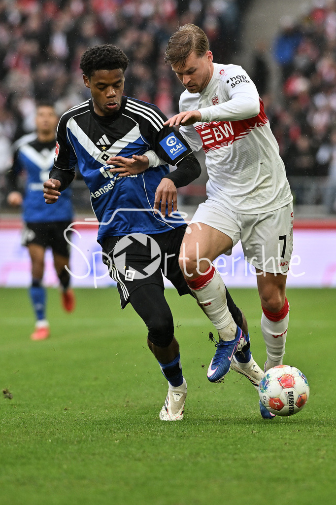 VfB Stuttgart - Hamburger SV | STUTTGART, GERMANY - 12. APRIL: tackle between Warmed OMARI (Hamburger SV 17) and Maximilian MITTELSTÄDT (VfB Stuttgart 7) during the Bundesliga Match between VfB Stuttgart vs. Hamburger SV on Matchday 29 at MHP Arena / DFL REGULATIONS PROHIBIT ANY USE OF PHOTOGRAPHS AS IMAGE SEQUENCES AND/OR QUASI-VIDEO