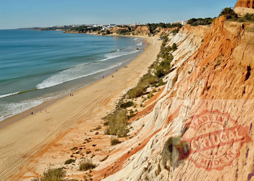 Praia da Falésia beach and colorful cliffs in Algarve, Portugal | Algarve coastline with golden sand, blue ocean waves, and dramatic colorful cliffs - Realisiert mit Pictrs.com