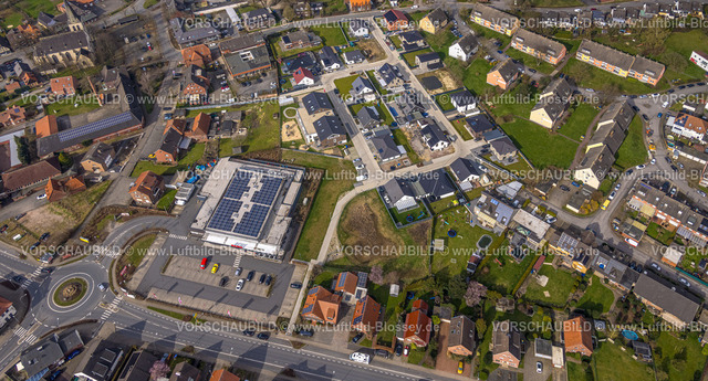 Ahlen240306159Dolberg | Luftbild, Wohngebiet Ortsansicht Ortsteil Dolberg, neuer REWE Supermarkt mit Solardach, Windräder, neuer Kreisverkehr Alleestraße und Uentroper Straße, Neubau Wohngebiet Hases Wiese, kath. St. Lambertus KIrche, Ahlen, Dolberg, Ruhrgebiet, Deutschland