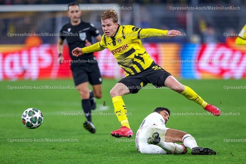 UCL04032501026 | 04.03.2025, Fußball, UEFA Champions League, Borussia Dortmund - OSC Lille, Signal Iduna Park, Runde der 16, Saison 2024 2025: Daniel Svensson (BVB #24)  springt über Benjamin Andre (LOSC Lille #21)