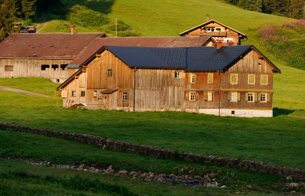 Bregenzerwälderhaus | Schoenenbach, Austria - July 24, 2012: Vorsäßsiedlung Schönenbach;  Bregenzerwälderhaus im Sonnenlicht. - Realisiert mit Pictrs.com