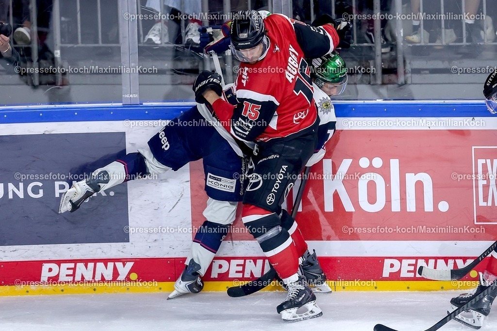 KEC20042601049 | 20.04.2026, Eishockey, DEL Halbfinale Play-Offs, Kölner Haie - Eisbären Berlin, Spiel 6, Lanxess-Arena Köln: Louis-Marc Aubry (Kölner Haie #15) im Zweikampf gegen  Jean-Sebastien Dea (Eisbären Berlin #17) 