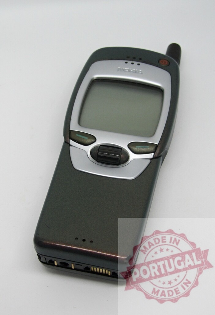 Old Nokia mobile phone showing blank screen on white background | Vintage Nokia cell phone isolated on a white background, displaying a blank screen - Realized with Pictrs.com