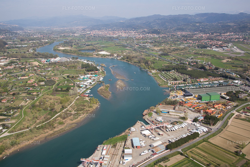 Aerial view: View of the town in Ameglia in the state Liguria, Italy. – Photo: IMG_087144.jpg taken on 04/04/2016 by Werner Riehm/FLY-FOTO.com – Resolution of the original: 5277 x 3518 px