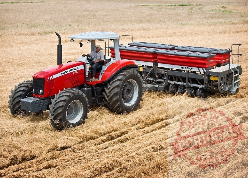 Massey Ferguson tractor seeding barley field | Farmer operating Massey Ferguson tractor with seeder planting crops in a rural field - Realized with Pictrs.com