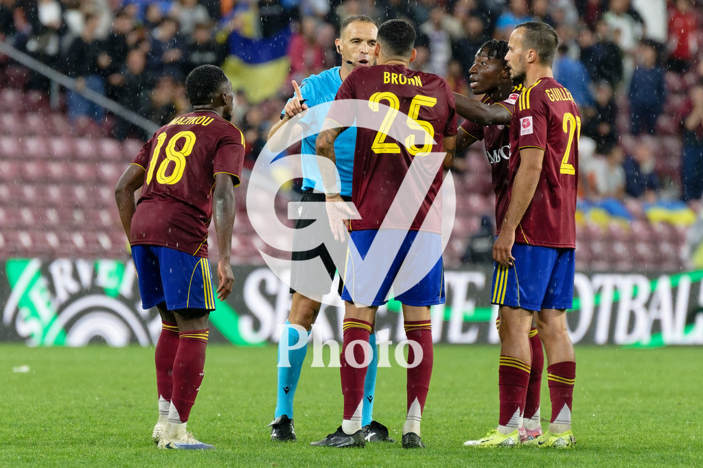UEFA Conference League Play-offs 2nd leg - Servette FC v FC Shakhtar Donetsk | Dylan Bronn (25 Servette FC) speaks with Guillermo Cuadra Fernandez referee  during the UEFA Conference League Play-offs 2nd leg match between Servette FC and FC Shakhtar Donetsk at Stade de Geneve in Geneva, Switzerland