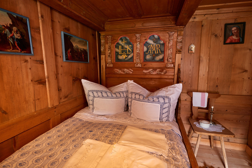 Heimatmuseum Bezau | Bezau, Austria - July 27, 2017: Heimatmuseum Bezau, Blick in das Elternschlafzimmer mit Ehebett. - Realisiert mit Pictrs.com