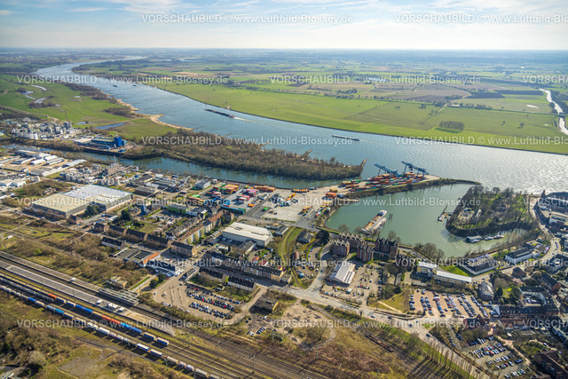 Emmerich240313116 | Luftbild, Containerhafen Emmerich und Fluss Rhein, Baustelle mit Neubau Hallenkomplex Immobilienunternehmen Hillwood an der Reeser Straße, Oleon Emmerich Chemiewerk, Emmerich am Rhein, Nordrhein-Westfalen, Deutschland