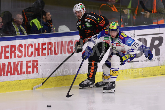 Moser Medical Graz 99ers vs EC iDM Wärmepumpen VSV – Ice Hockey    | Graz, Austria, 27.FEB.26 - ICE HOCKEY - ICE Hockey League, Graz 99ers vs Villacher SV. The image shows Josh Currie (99ers) and Felix Maxa (EC VSV).     