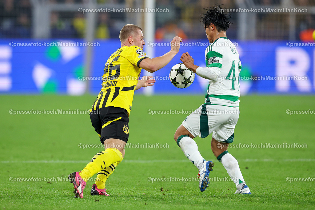 BVB01102402239 | 01.10.2024, Fußball, UEFA Champions League, Borussia Dortmund - Celtic Glasgow, 2. Spieltag, Signal Iduna Park, Saison 2024 2025: Julian Ryerson (BVB #26) gegen Reo Hatate (Celtic #41)