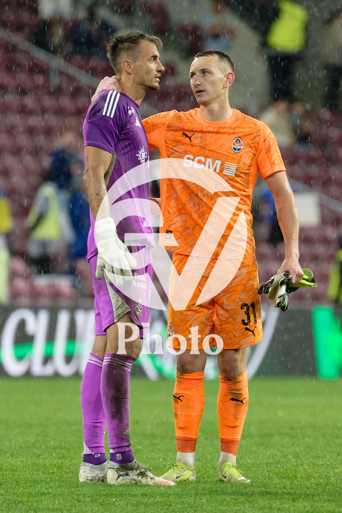 UEFA Conference League Play-offs 2nd leg - Servette FC v FC Shakhtar Donetsk | Dmytro Riznyk (31 FC Shakhtar Donetsk) speaks with Joel Mall (1 Servette FC) during the UEFA Conference League Play-offs 2nd leg match between Servette FC and FC Shakhtar Donetsk at Stade de Geneve in Geneva, Switzerland