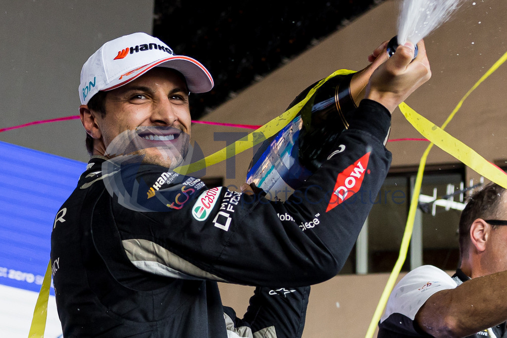 GEPA-20230422-101-147-0099-2 | BERLIN,GERMANY,22.APR.23 - MOTORSPORTS, FORMEL E - E-Prix of Berlin, Berliner Tempelhof Airport Circuit. Image shows Mitch Evans (NZL / Jaguar). Keywords: podium, champagne shower.  
Photo: GEPA pictures/ Matthias Trinkl