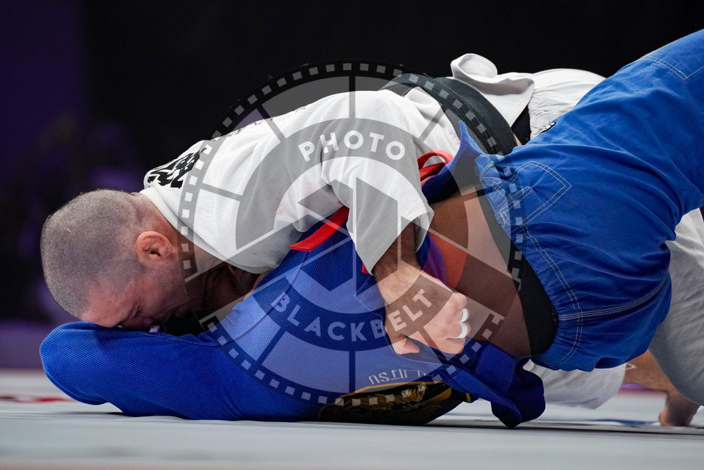 20231110PBB2498 | Fighters compete during the AJP World Professional Championship blackbelt finals in the Mubadala Arena in Abu Dhabi, Arab United Emirates, on November 10, 2023.