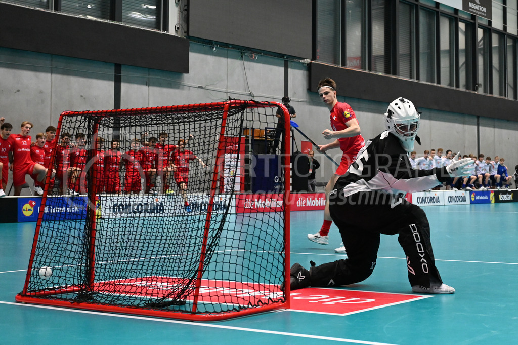 Switzerland B U19 vs Finland U19 - 2. February 2024 | Switzerland B U19 vs Finland U19
U19 Men International Matches in Switzerland
GoEasy Arena, Siggenthal Station
Switzerland defender #28 Maёl Marthaler scores against Finland goalkeeper #31 Veikko Rauhanen.
Credit: Markus Aeschimann | <a href="https://www.markus-aeschimann.ch">Sportfotografie Markus Aeschimann</a> | <a href="https://www.instagram.com/sportfotografie.aeschimann">@sportfotografie.aeschimann</a> - Realisiert mit Pictrs.com