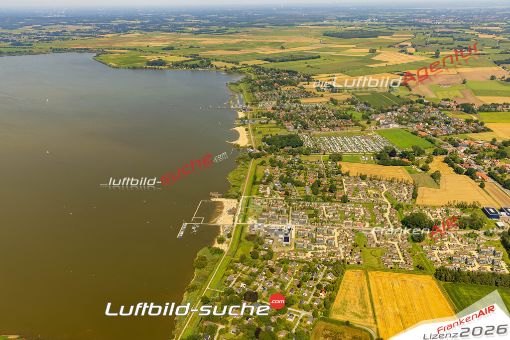 Bild der Stadt Lembruch Seeuferstrasse - Die Luftaufnahme wurde 2025 vom UL-Flugzeug heraus erstellt ( keine Drohne ) - Hochauflösende Luftaufnahme - für professionelle Ausdrucke geeignet. Die Geschenkidee !Hier alle&nbsp;Infos zur Lizenzierung der LuftaufnahmeWir fliegen auch dieses Jahr wieder in Ihre Region um Luftbilder zu erstellen.- Luftbild anfragen