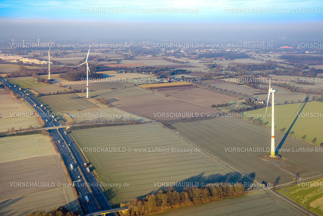 Hamm250200451Rhynern | Luftbild, Autobahn A2, Wiesen und Felder mit Windräder, Fernsicht zum Industriegebiet Weetfelder Straße mit Dunstglocke, Stadtbezirk Rhynern, Hamm, Ruhrgebiet, Nordrhein-Westfalen, Deutschland