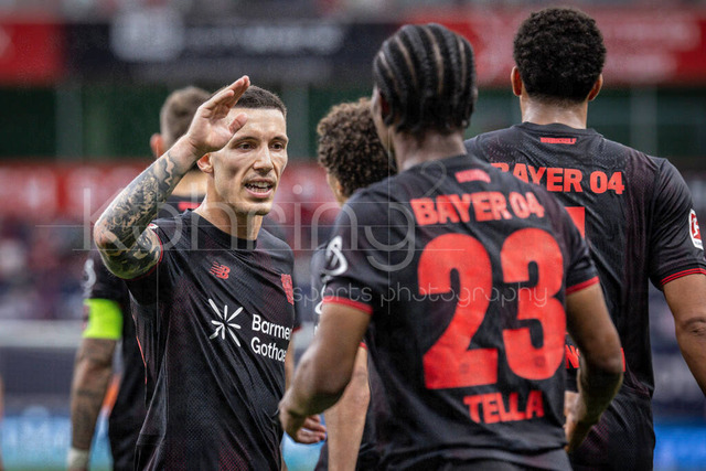 German Bundesliga, Bayer 04 Leverkusen vs. RB Leipzig, 02.05.2026 | LEVERKUSEN, GERMANY - MAY 2, 2026 :  Nathan Tella (Bayer 04 Leverkusen, 23) celebrates scoring his team's second goal with Alejandro Grimaldo (Bayer 04 Leverkusen, 20) during the German Bundesliga match on gameday 32 between Bayer 04 Leverkusen vs. RB Leipzig at BayArena on May 2, 2026 in Leverkusen, Germany. DFL REGULATIONS PROHIBIT ANY USE OF PHOTOGRAPHS AS IMAGE SEQUENCES AND/OR QUASI-VIDEO.