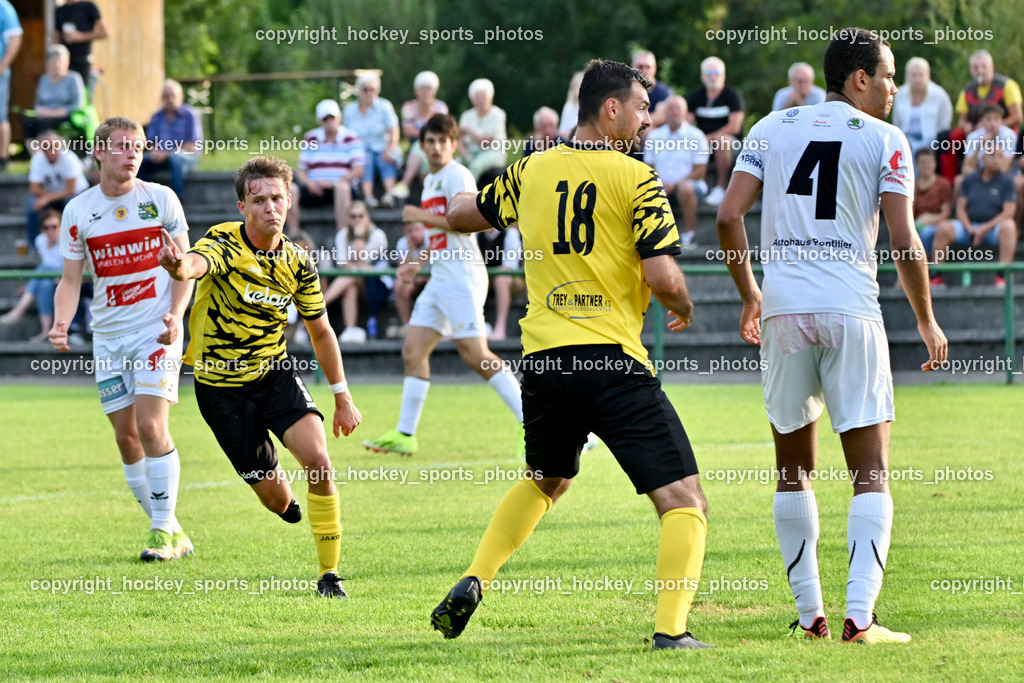 FC Faakersee vs. Rapid Lienz  | #5 Cajetan Maria Thaddäus Kolig FC Faakersee, #18 Andreas Unterguggenberger FC Faakersee, #4 Aziz Olayemi Ayodeji Rapid Lienz, FC Faakersee vs. Rapid Lienz , FC Faakersee vs. Rapid Lienz  am 04.08.2024 in Faakersee (Sportplatz Faakersee), Austria, (Photo by Bernd Stefan)