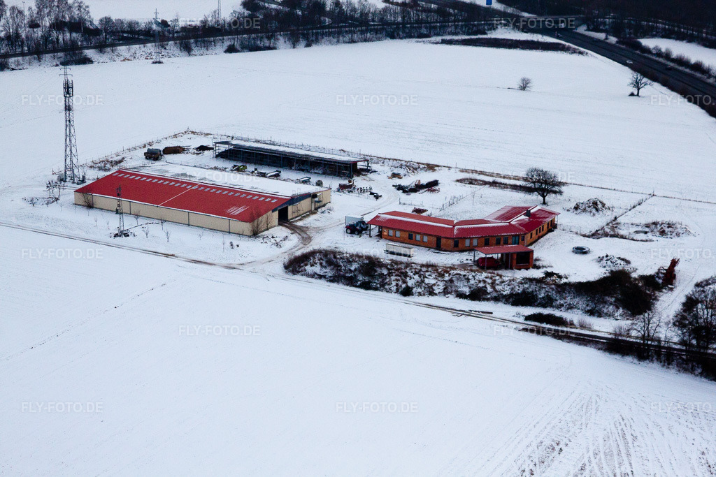 Luftbild: Hühnerhof Eierfarm im Winter bei Schnee in Erlenbach bei Kandel im Bundesland Rheinland-Pfalz in Deutschland. Foto: IMG_23812.jpg vom 16.01.2010 durch Werner Riehm/FLY-FOTO.de
