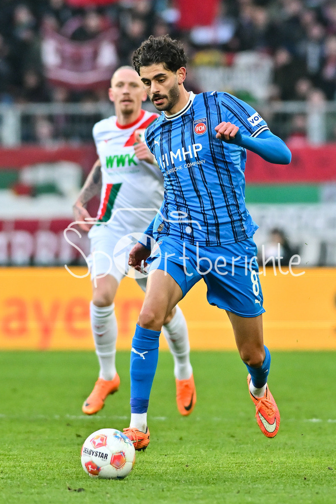 FC Augsburg - 1. FC Heidenheim | AUGSBURG, GERMANY - 15. FEBRUARY: am Ball Eren Sami DINKCI (1. FC Heidenheim 8)  Einzelfoto / Freisteller während dem Bundesligamatch zwischen dem FC Augsburg und dem 1. FC Heidenheim am 22. Spieltag in der WWK-Arena / DFL REGULATIONS PROHIBIT ANY USE OF PHOTOGRAPHS AS IMAGE SEQUENCES AND/OR QUASI-VIDEO