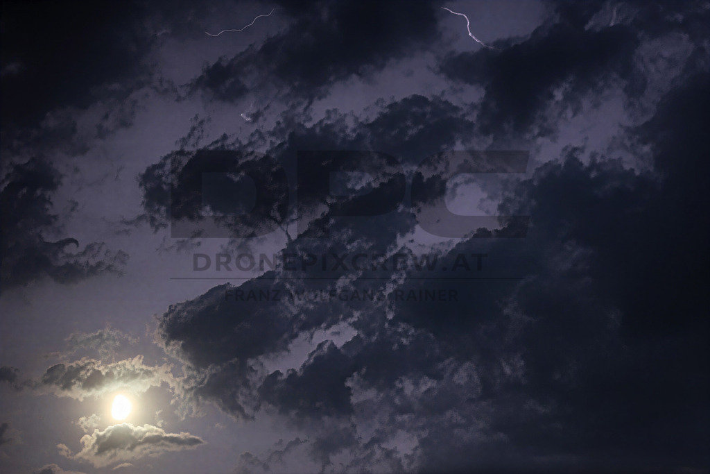 Lightning Storm over the Almenland | Multiple lightning strikes illuminate the night sky over the Almenland region in Austria during a powerful summer thunderstorm. - Realisiert mit Pictrs.com