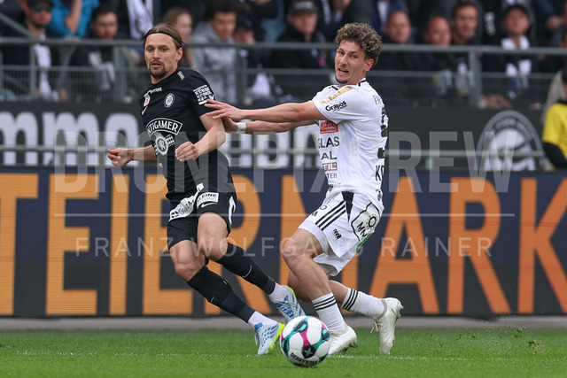 SK Puntigamer Sturm Graz vs TSV Egger Glas Hartberg – Championship Group    | Graz, Austria, 12.Apr.26 - SOCCER - ADMIRAL Bundesliga, SK Puntigamer Sturm Graz vs TSV Egger Glas Hartberg. The image shows Stefan Hierlaender (STU) and Damjan Kovacevic (Hartberg).    