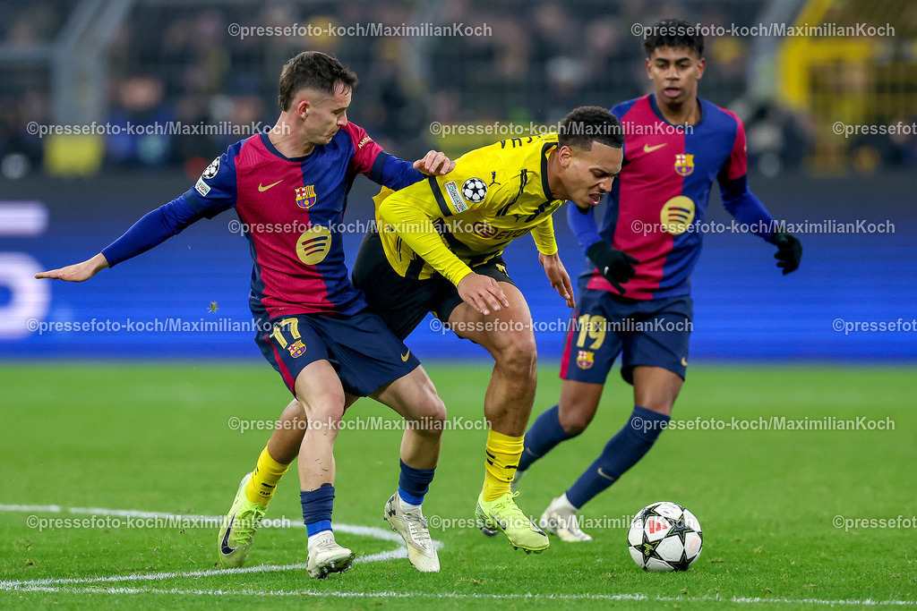 UCL11122402239 | 11.12.2024, UEFA Champions League, Borussia Dortmund - FC Barcelona, 8. Spieltag, Signal Iduna Park, Saison 2024 2025: Marc Casado (Barca #17) und Lamine Yamal (Barca #19) im Zweikampf gegen Felix Nmecha (BVB #8) 