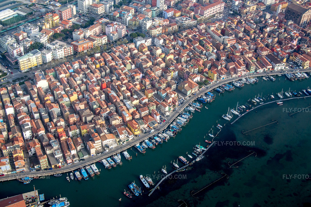 Aerial view: Port facilities on the sea coast of the Venetian Lagoon in the district of Sottomarina in Chioggia in the state Veneto, Italy. – Photo: IMG_087582.jpg taken on 04/06/2016 by Werner Riehm/FLY-FOTO.com – Resolution of the original: 5472 x 3648 px