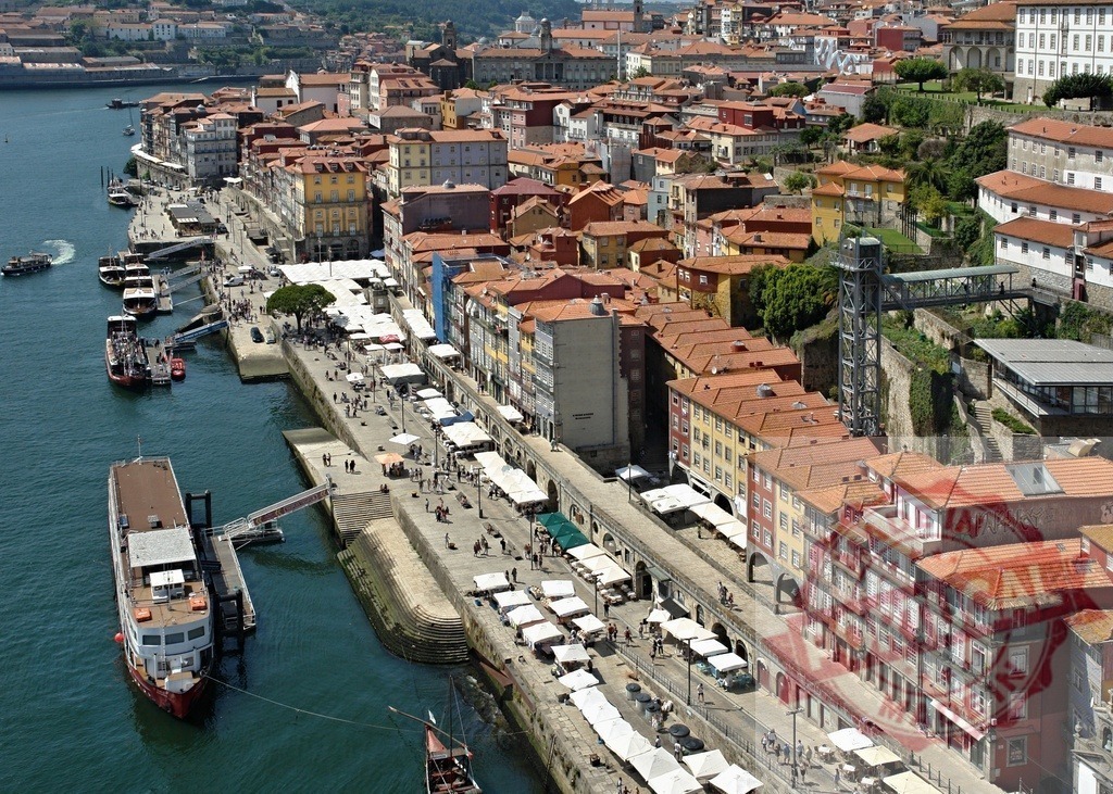 Porto Ribeira waterfront historic district along Douro River | Colorful buildings lining Ribeira Square with market stalls and people along the Douro River - Realized with Pictrs.com