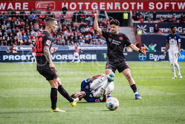 German Bundesliga, Bayer 04 Leverkusen vs. Hamburger SV, 16.05.2026 | LEVERKUSEN, GERMANY - MAY 16, 2026 :  Ibrahim Maza (Bayer 04 Leverkusen, 30) tackles Nicolas Capaldo (Hamburger SV, 24), on the left +l20 during the German Bundesliga match on gameday 34 between Bayer 04 Leverkusen vs. Hamburger SV at BayArena on May 16, 2026 in Leverkusen, Germany. DFL REGULATIONS PROHIBIT ANY USE OF PHOTOGRAPHS AS IMAGE SEQUENCES AND/OR QUASI-VIDEO.