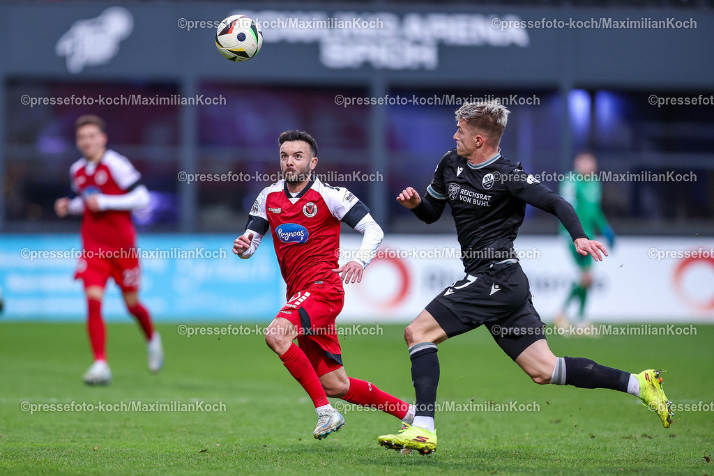 FCVK21122401056 | 21.12.2024, Fußball, FC Viktoria Köln – SV Sandhausen, 3.Liga, Sportpark Höhenberg, Saison 2024 2025: Albion Vrenezi (Viktoria Köln #10) im Zweikampf gegen David Otto (Sandhausen #17)DFB regulations prohibit any use of photographs as image sequences and or quasi-video.