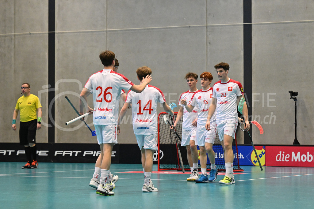 Switzerland B U19 vs Switzerland U19 - 4. February 2024 | Switzerland B U19 vs Switzerland U19
U19 Men International Matches in Switzerland
GoEasy Arena, Siggenthal Station
Team Switzerland B scores with forward #27 Levin Peter, forward #13 Levi Walser and forward #20 Jamie Martinjas.
Credit: Markus Aeschimann | <a href="https://www.markus-aeschimann.ch">Sportfotografie Markus Aeschimann</a> | <a href="https://www.instagram.com/sportfotografie.aeschimann">@sportfotografie.aeschimann</a> - Realisiert mit Pictrs.com