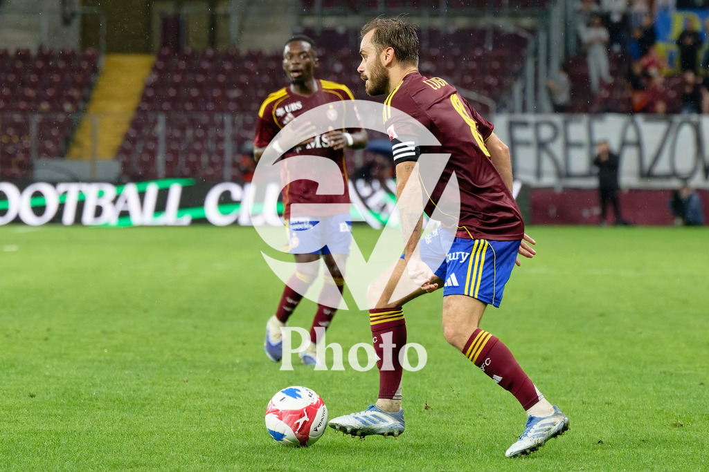 UEFA Conference League Play-offs 2nd leg - Servette FC v FC Shakhtar Donetsk | Timothe Cognat (8 Servette FC) controls the ball (action)  during the UEFA Conference League Play-offs 2nd leg match between Servette FC and FC Shakhtar Donetsk at Stade de Geneve in Geneva, Switzerland