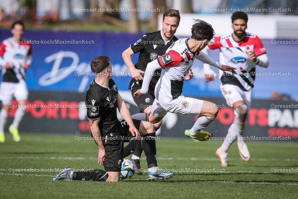 Koe3Liga24022401023 | 24.02.2024, Köln, Fußball, bwin 3. Liga Herren, Sportpark Höhenberg, 27. Spieltag, Saison 2023 2024, FC Viktoria Köln – SV Sandhausen: Jonas Weik (SV Sandhausen) gegen Luca de Meester de Tilbourg (Viktoria Köln). 
DFB regulations prohibit any use of photographs as image sequences and or quasi-video.